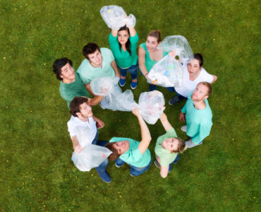 people-holding-garbage-bags-on-grass-2022-03-04-01-48-49-utc 1